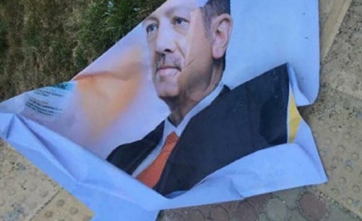 Erdoğan'ın afişlerini yırtan şahıs gözaltına alındı